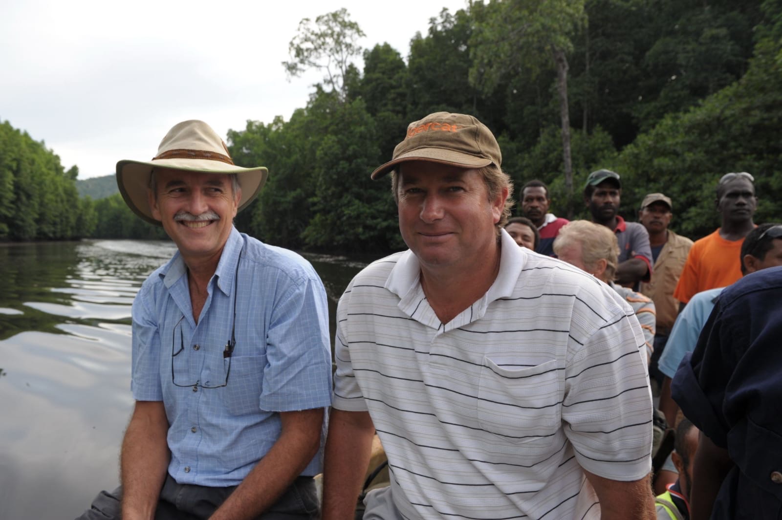 River crossing by boat to access remote forestry concession, Papua New Guinea